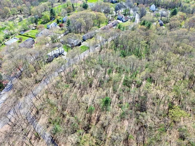 an aerial view of residential house with outdoor space