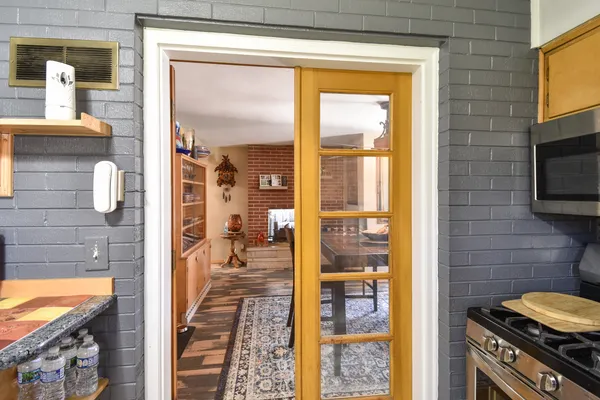a dining room with furniture and window