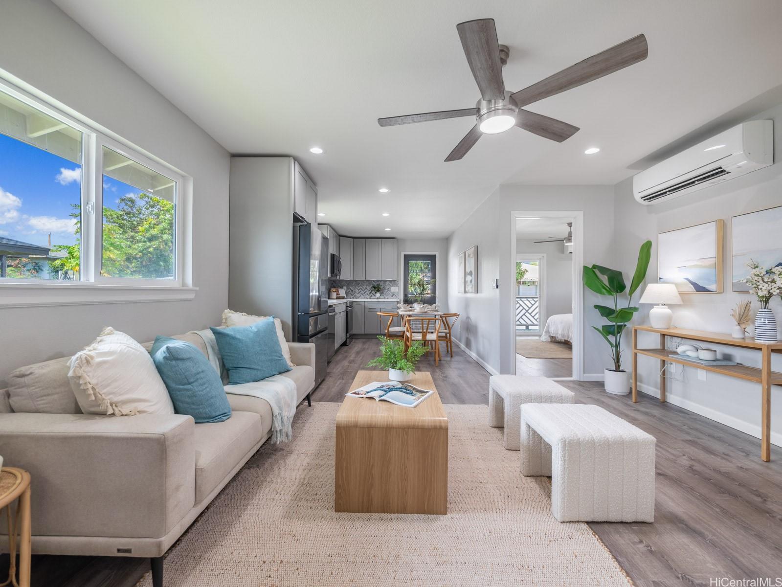 87-274 St John's Road Waianae, HI 96792 - Photo 1 of 1 a living room with furniture and a large window