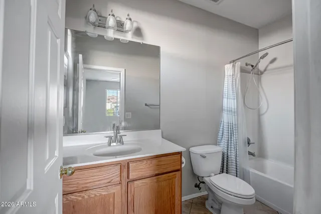 a view of a livingroom with stairs