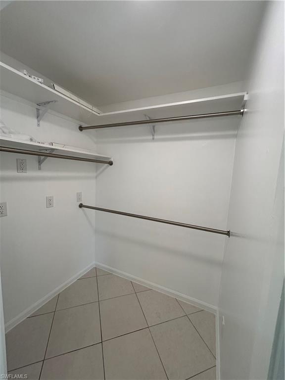 772 100th Avenue North Naples, FL 34108 - Photo 2 of 25 a view of a room with racks on the wall