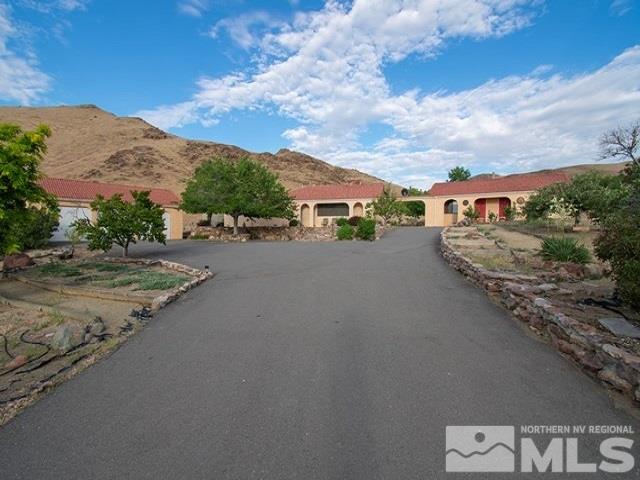 15300 Pyramid Way Reno, NV 89510 - Photo 3 of 25 a view of a street with an ocean view