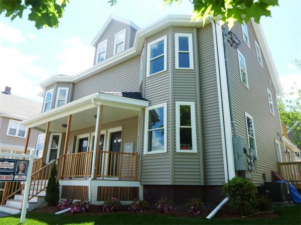 81 Ash Street, Unit 2 Waltham, MA 02453 - Photo 1 of 5 a front view of a house with balcony