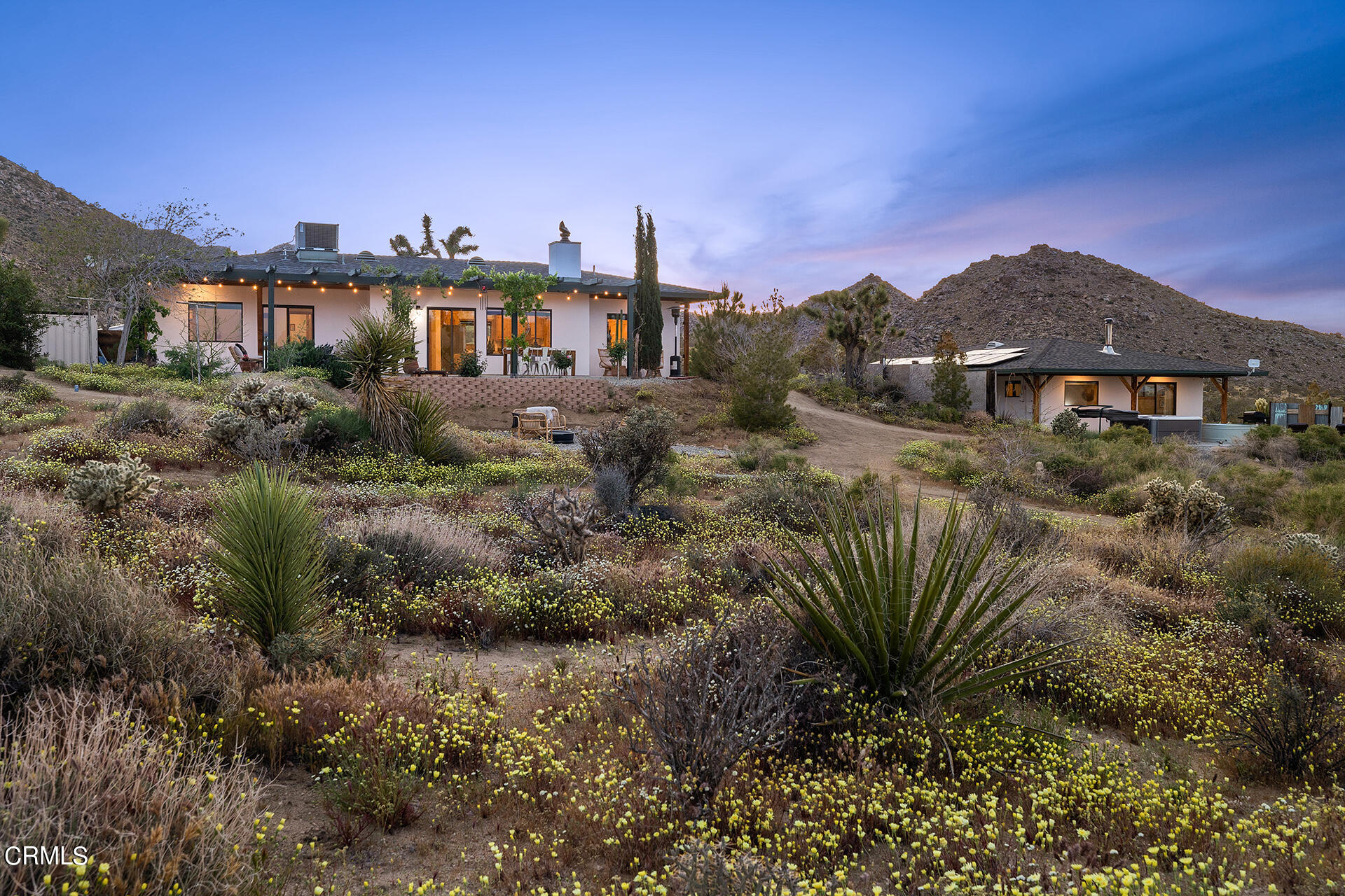 8331 Sunset Road Joshua Tree, CA 92252 - Photo 1 of 58 a view of a city with tall buildings