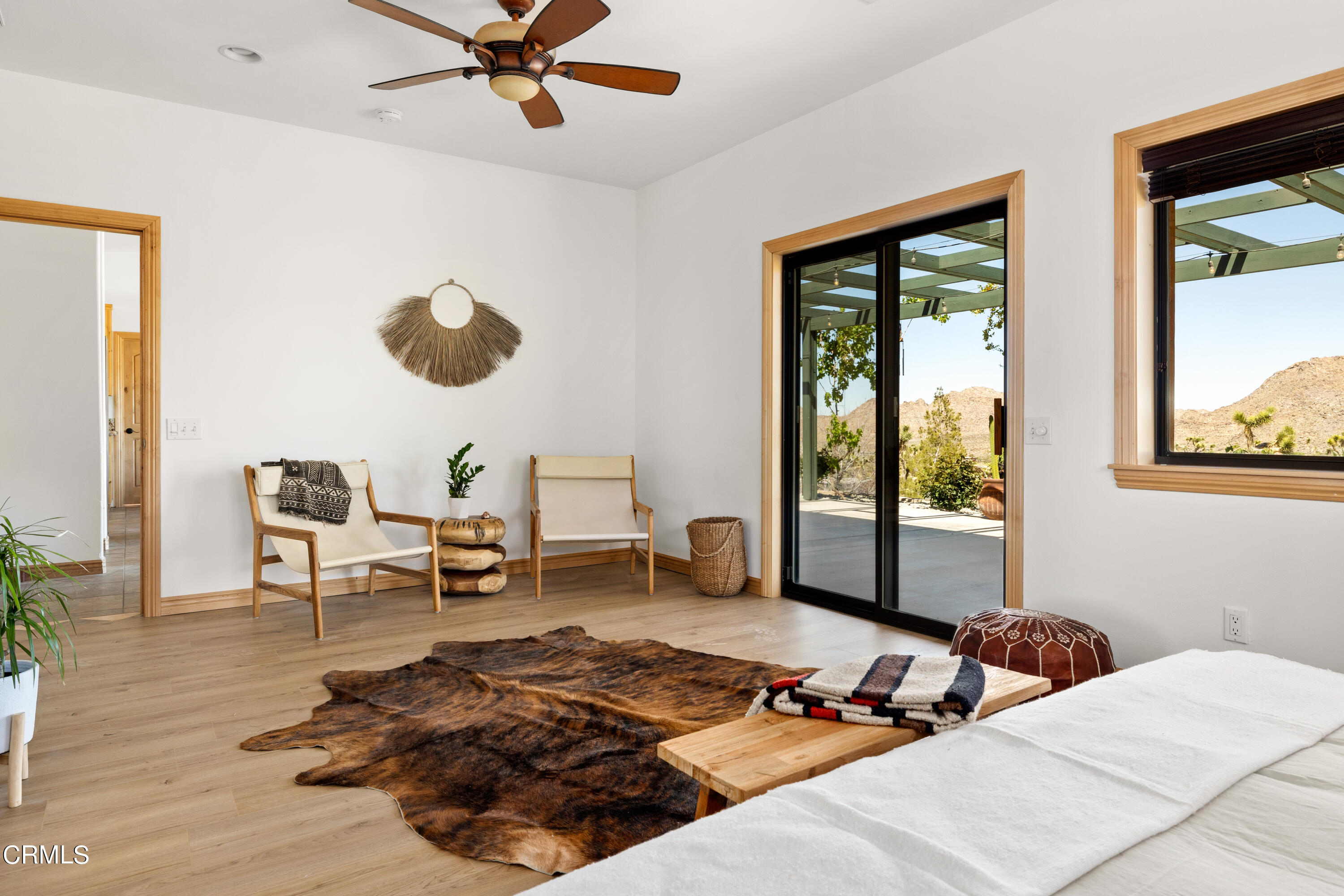 8331 Sunset Road Joshua Tree, CA 92252 - Photo 12 of 58 a bedroom with a bed and a window
