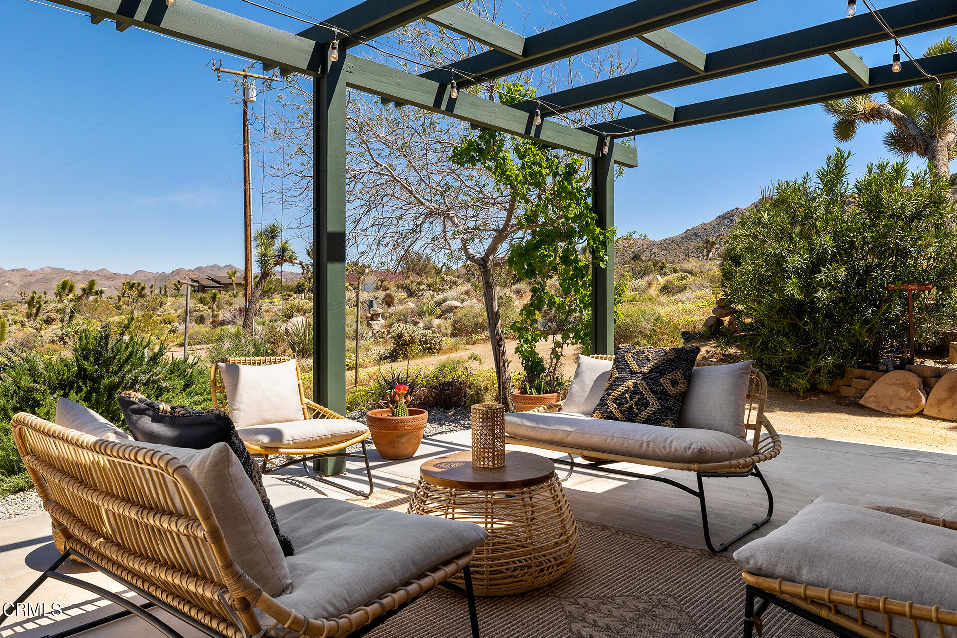 8331 Sunset Road Joshua Tree, CA 92252 - Photo 25 of 58 a view of a patio with swimming pool