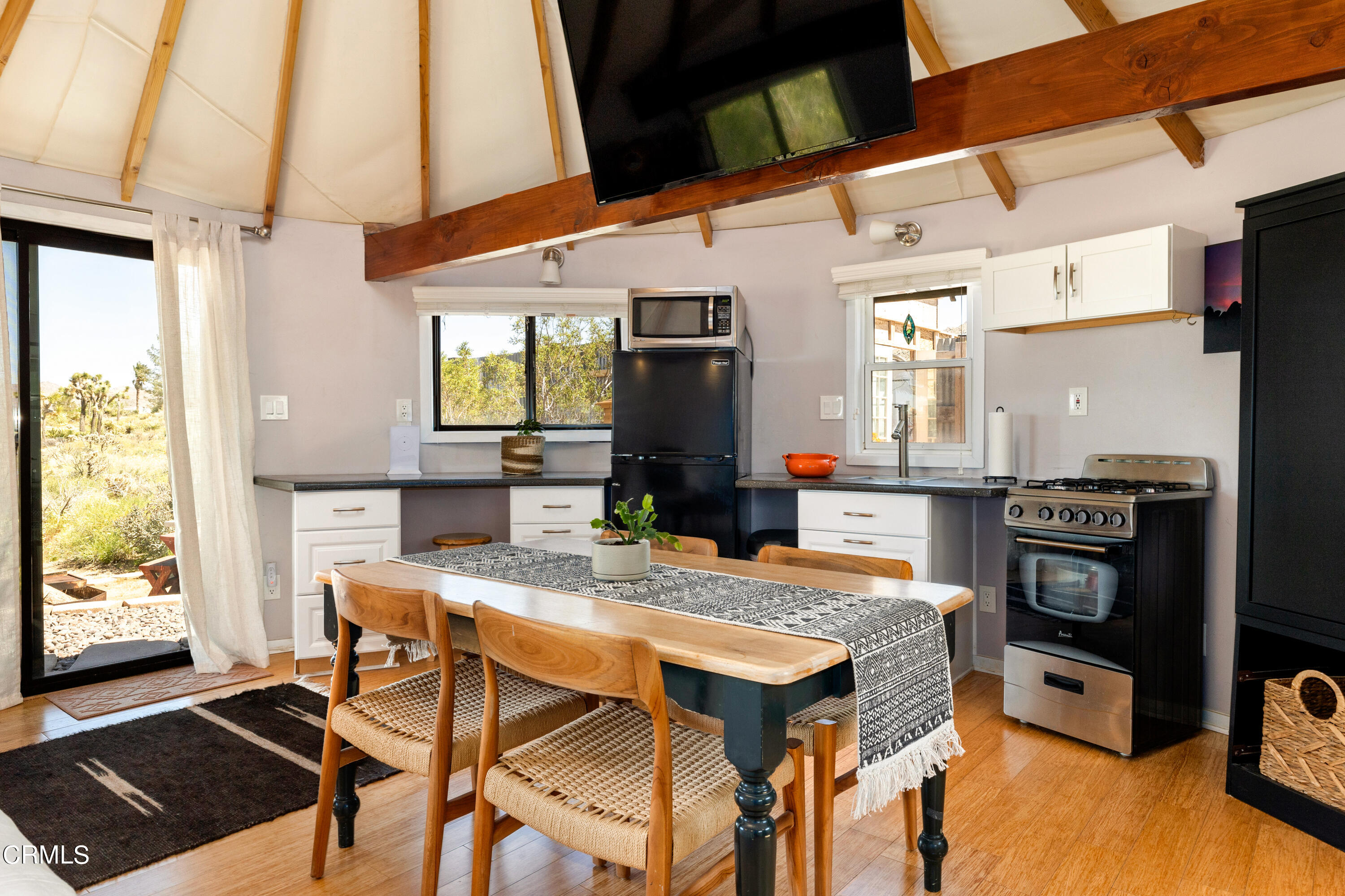 8331 Sunset Road Joshua Tree, CA 92252 - Photo 50 of 58 a view of a dining room with furniture