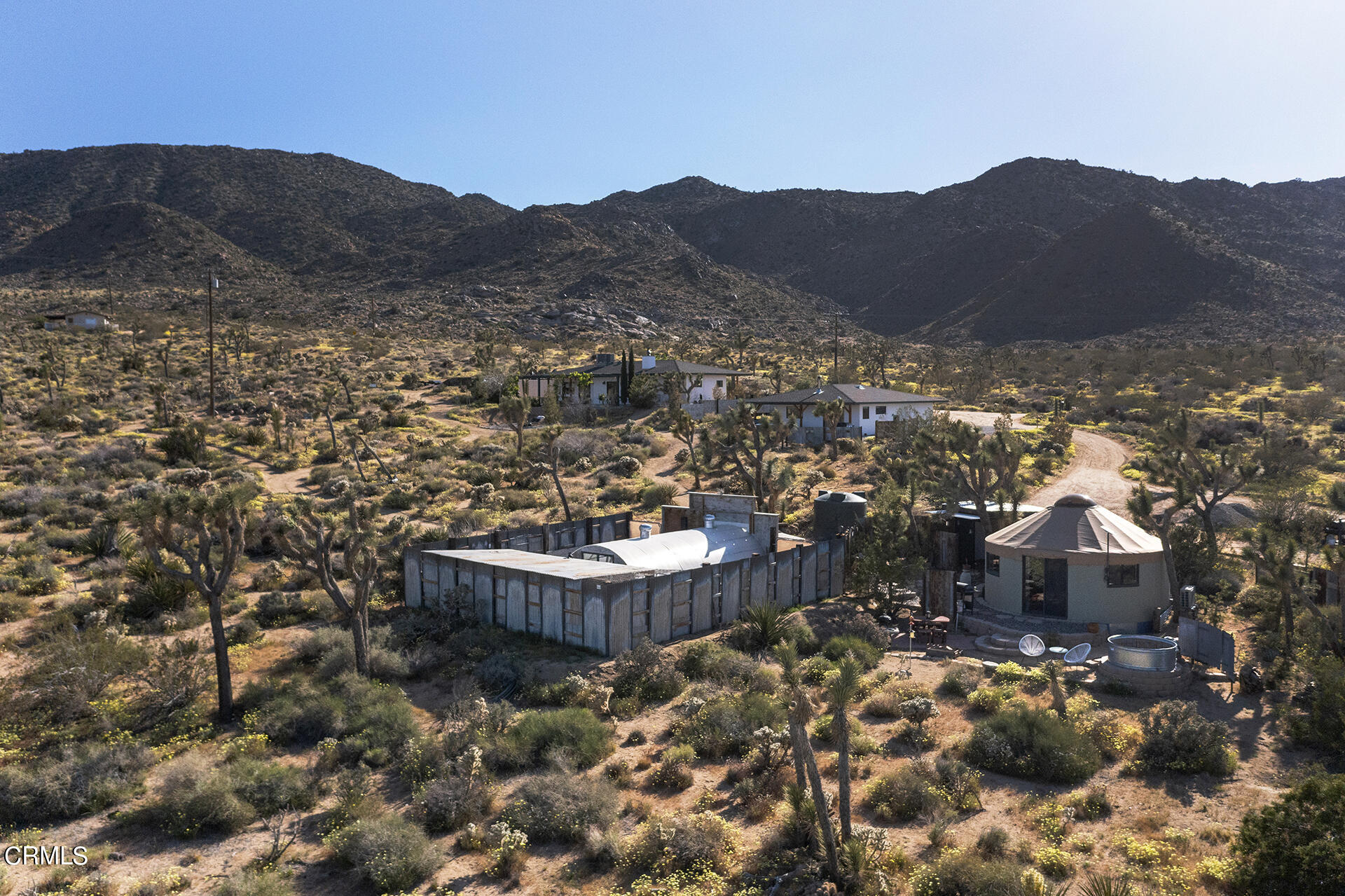 8331 Sunset Road Joshua Tree, CA 92252 - Photo 56 of 58 a view of a house with a mountain yard