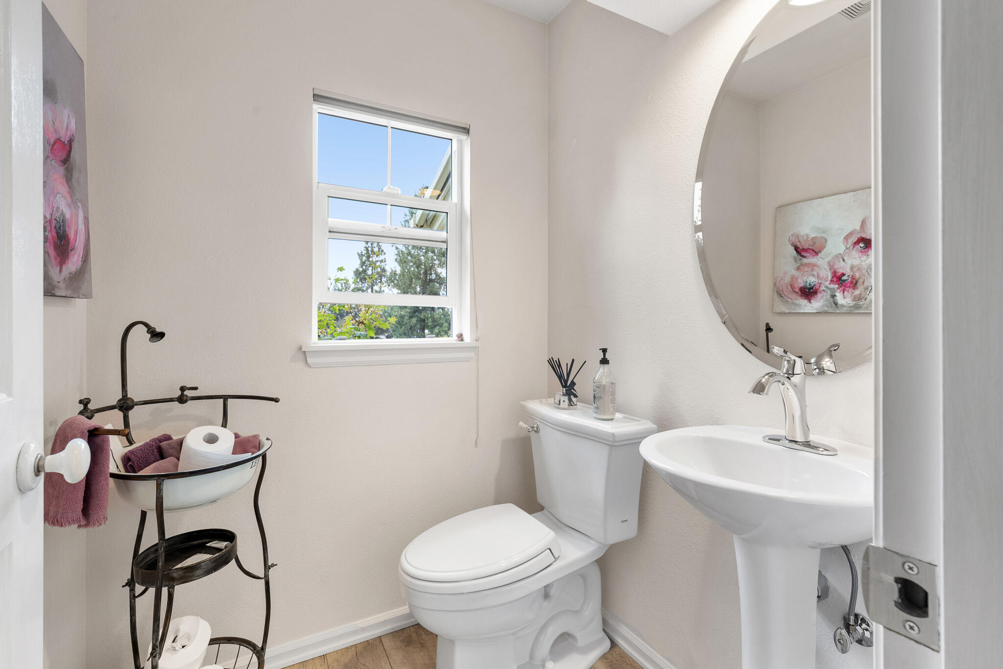624 Southwest Hill Street Bend, OR 97702 - Photo 36 of 45 a bathroom with a toilet sink and mirror