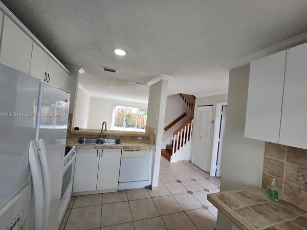 a view of street with houses