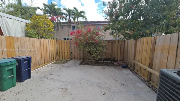 a view of multiple houses with a yard