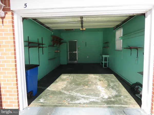 a bathroom with a sink a toilet and a shower