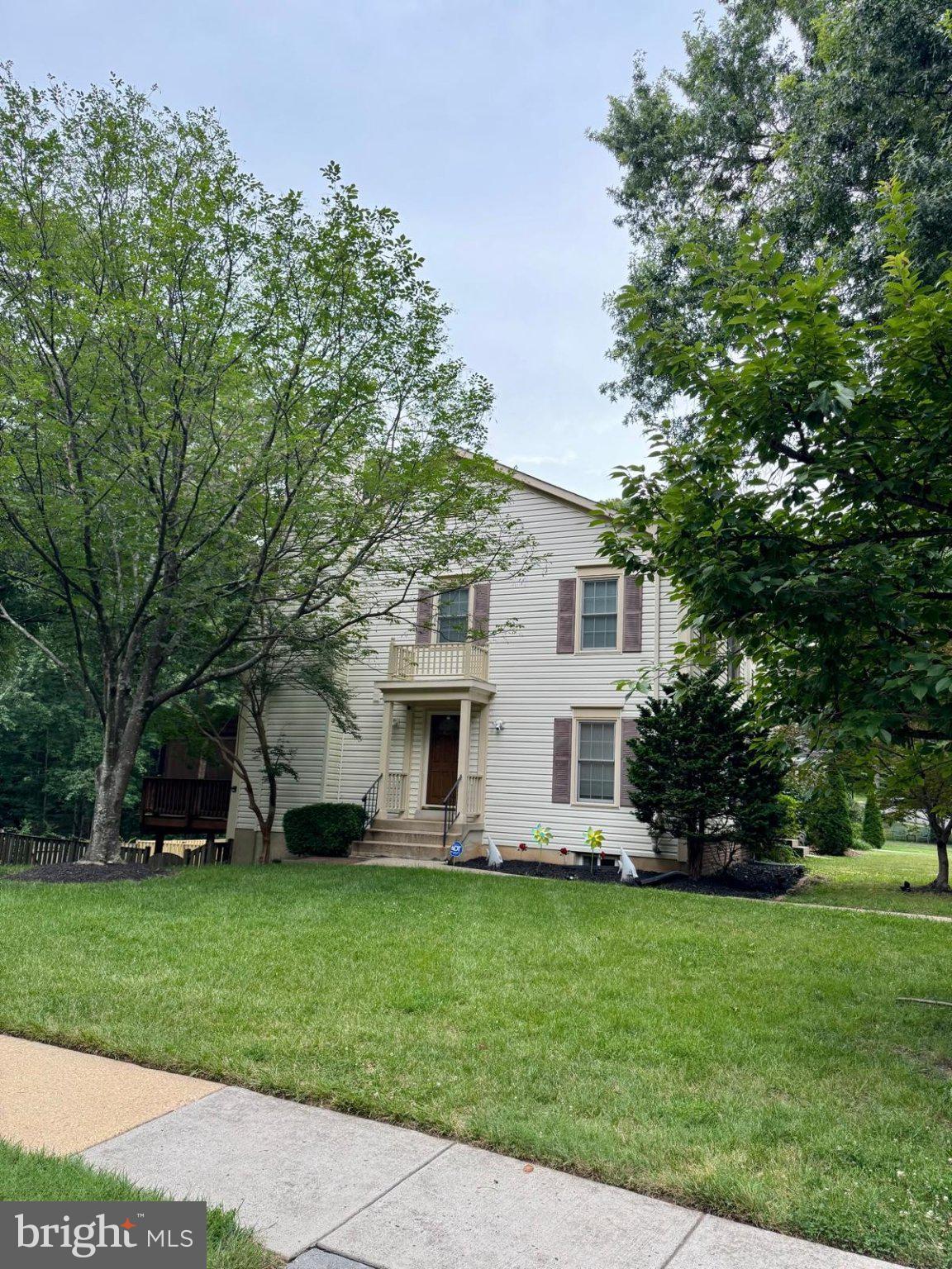 7408 Spring Tree Drive Springfield, VA 22153 - Photo 1 of 3 Charming home with lush greenery.