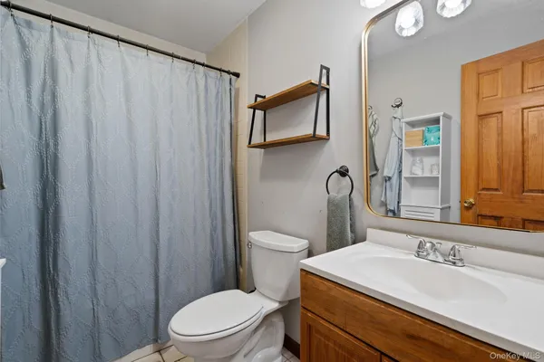 a view of a livingroom with furniture and storage