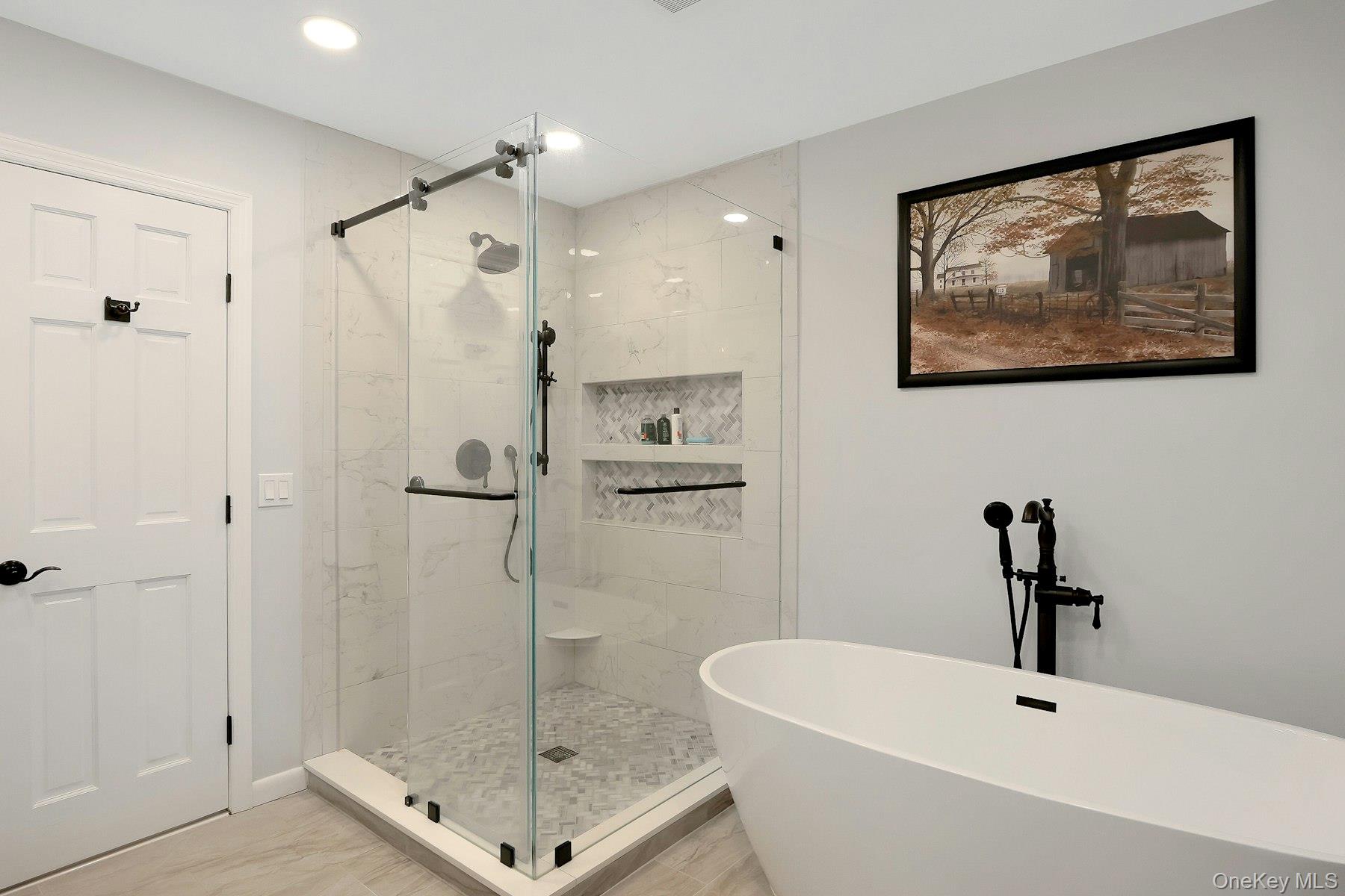 27 Deerpath Road Tuxedo Park, NY 10987 - Photo 16 of 32 a bathroom with a shower and a sink