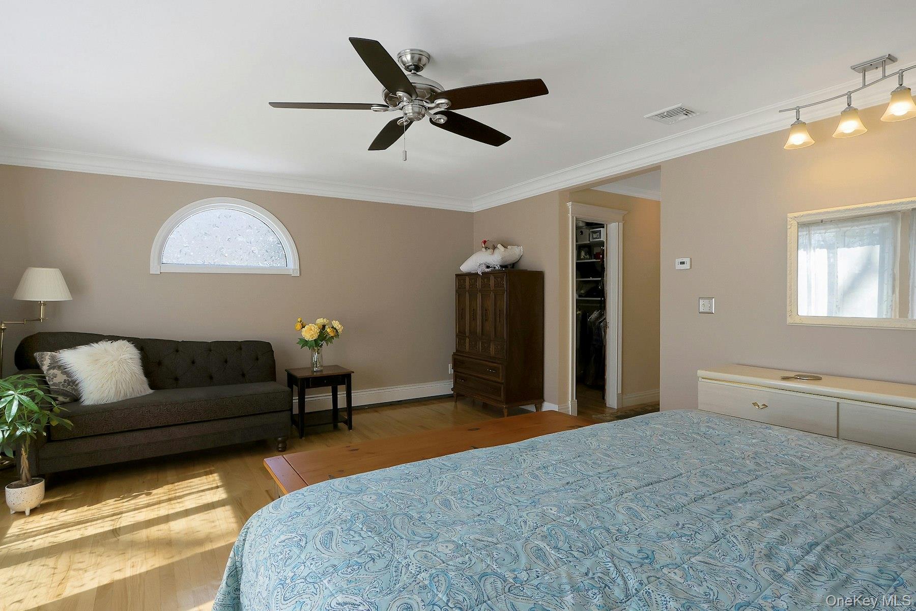 27 Deerpath Road Tuxedo Park, NY 10987 - Photo 18 of 32 a living room with furniture and a ceiling fan