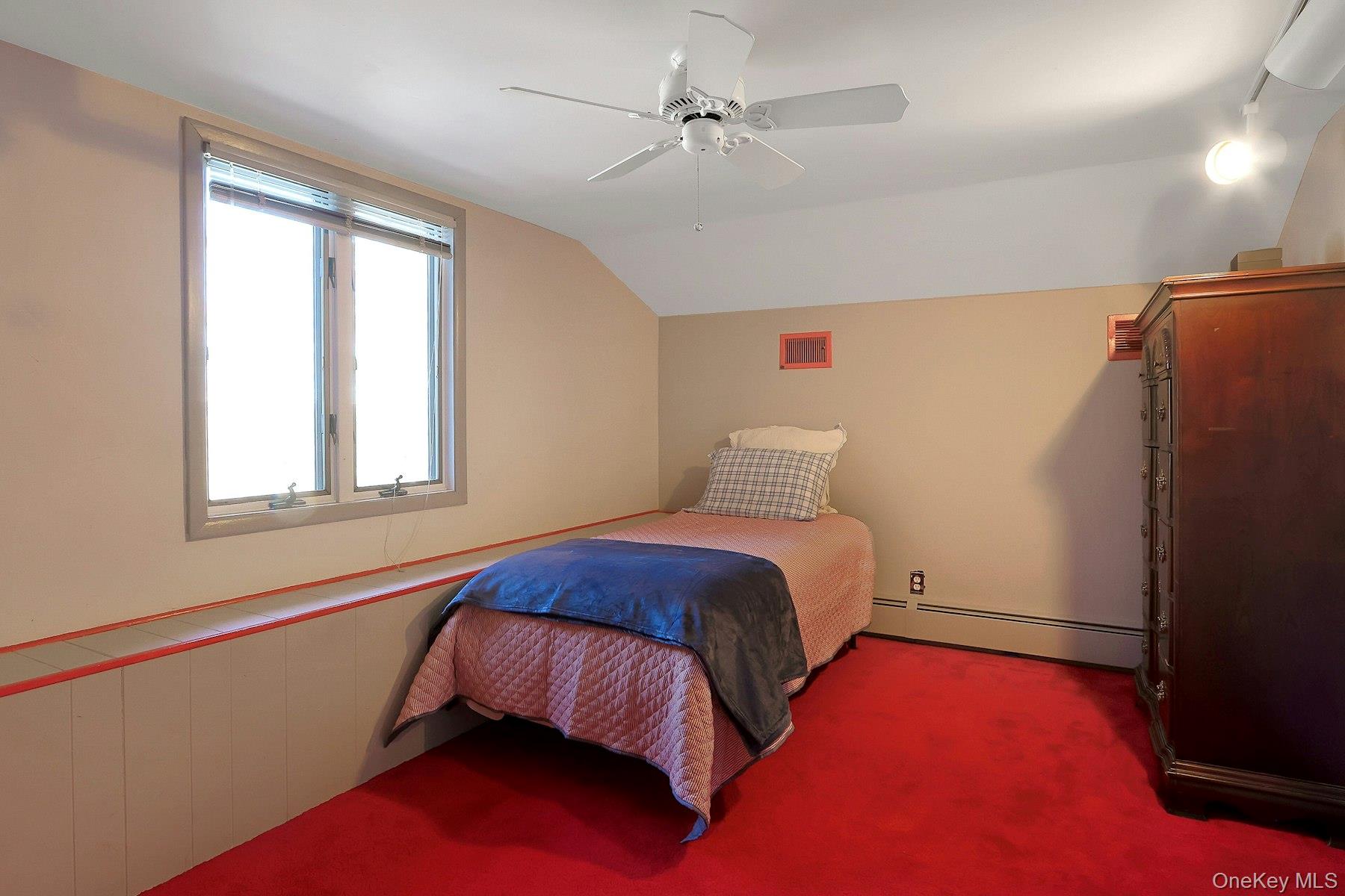 27 Deerpath Road Tuxedo Park, NY 10987 - Photo 22 of 32 a bedroom with a bed and window