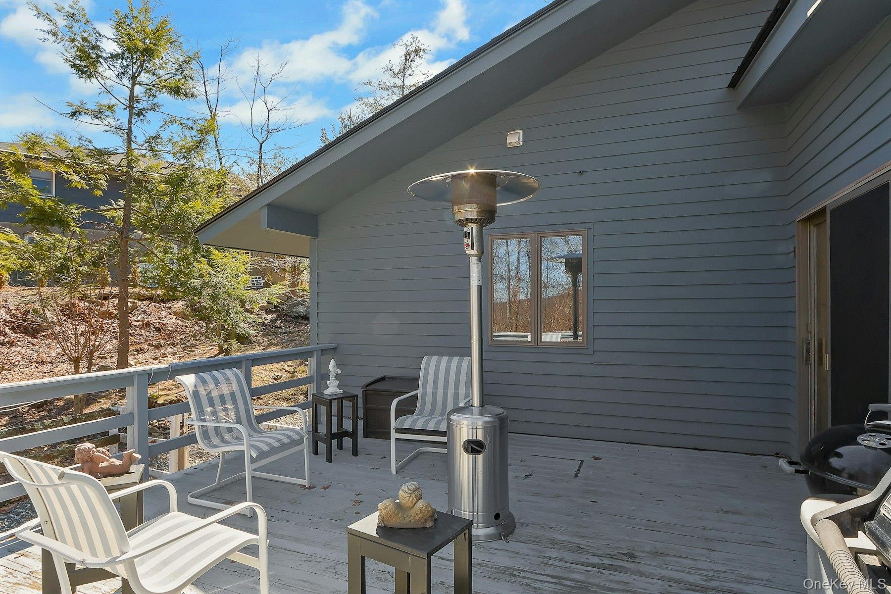27 Deerpath Road Tuxedo Park, NY 10987 - Photo 28 of 32 a view of a chairs and table in the balcony