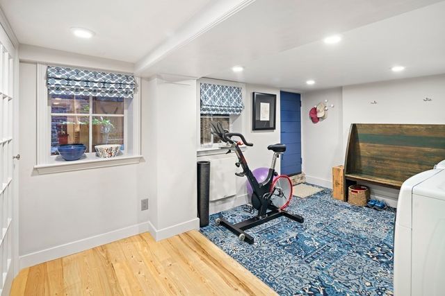 a utility room with sink dryer and washer