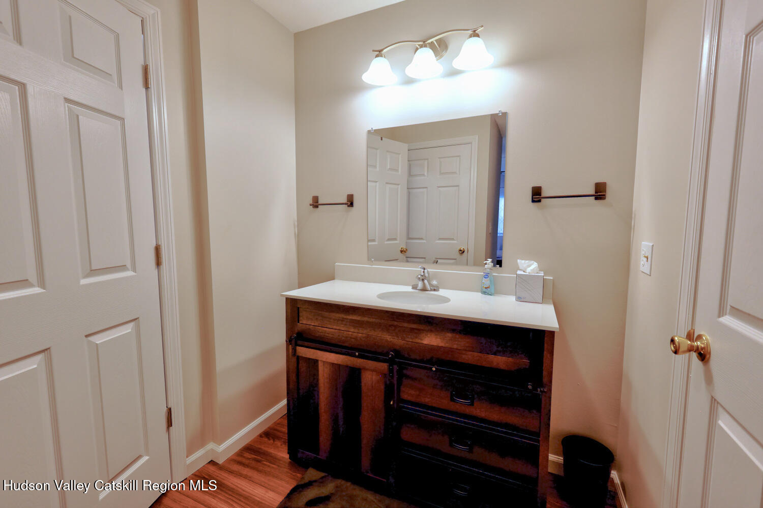 626 Bross Street Cairo, NY 12413 - Photo 35 of 78 a bathroom with a sink and a mirror