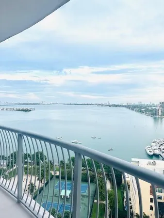 a balcony with an ocean view