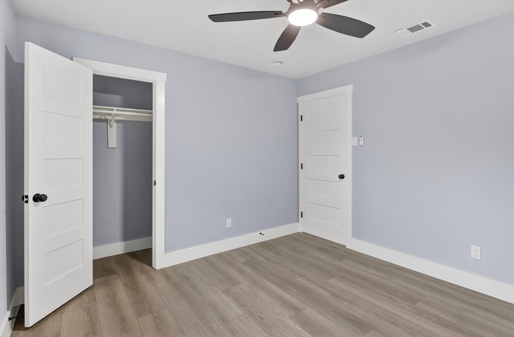 2005 Chestnut Road Carrollton, TX 75007 - Photo 23 of 35 wooden floor in an empty room