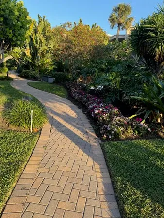 a view of path along with green space