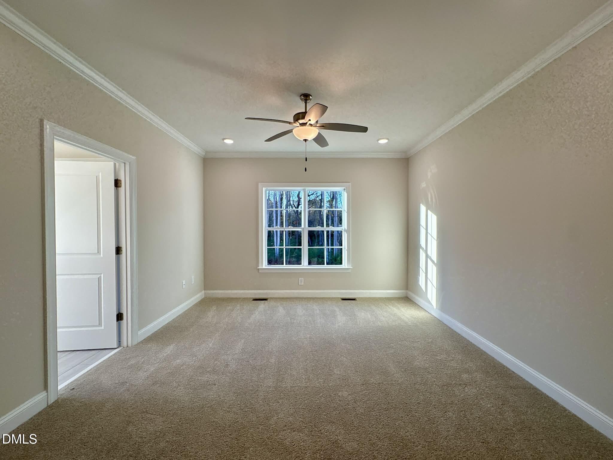 800 Emmett Ct Spring Spring Hope, NC 27882 - Photo 28 of 62 a view of an empty room with a window