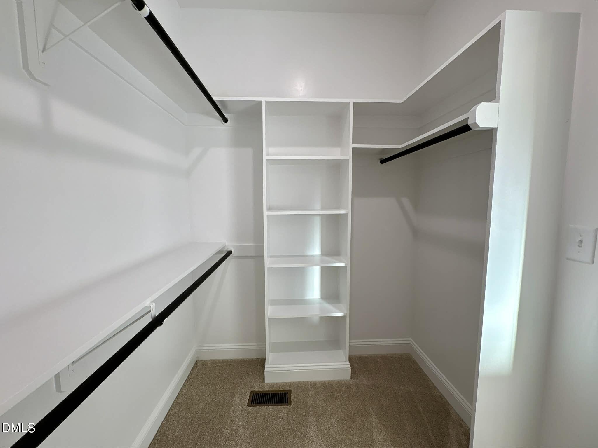 800 Emmett Ct Spring Spring Hope, NC 27882 - Photo 36 of 62 a view of an empty walk in closet