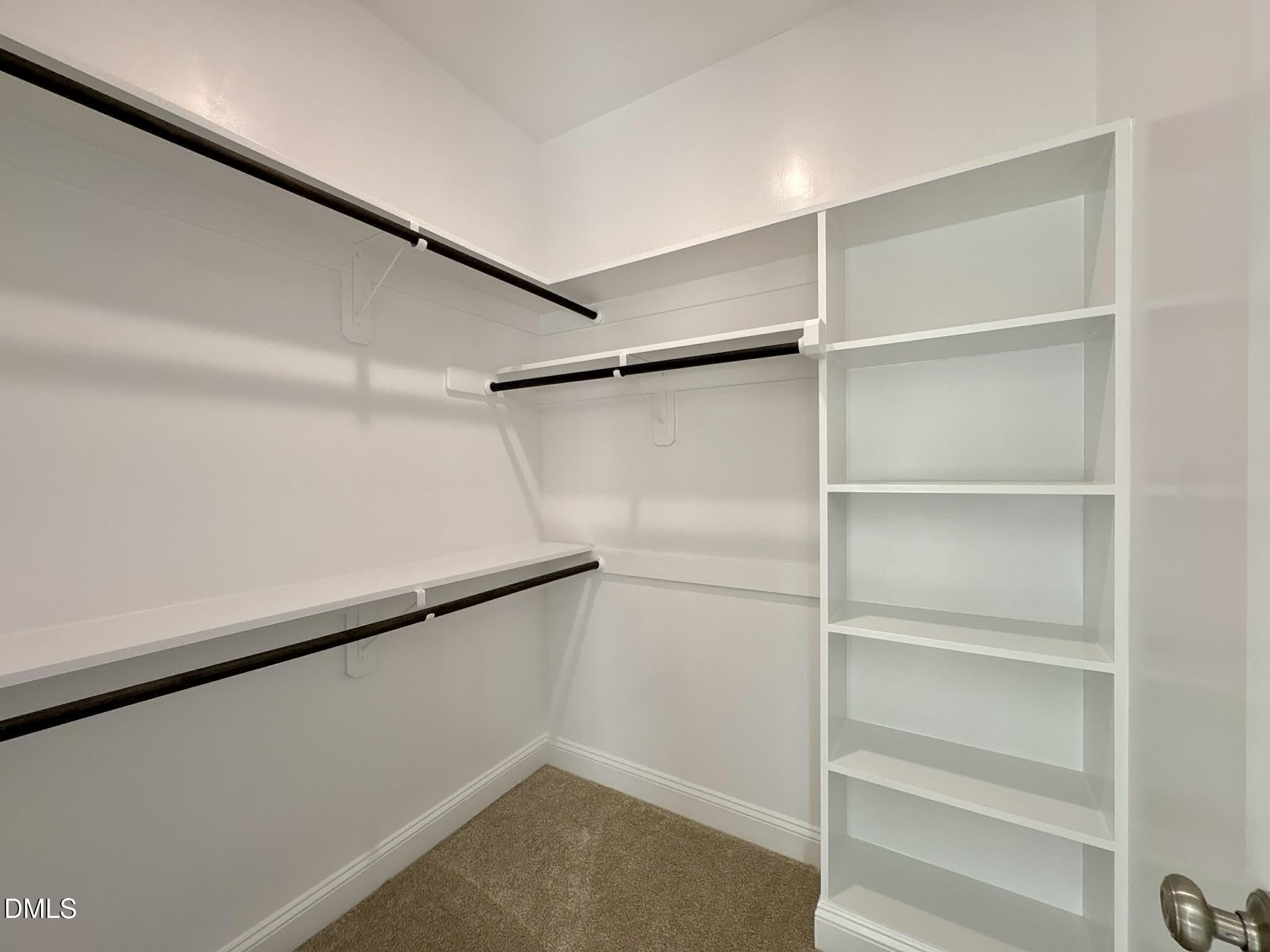 800 Emmett Ct Spring Spring Hope, NC 27882 - Photo 37 of 62 a view of an empty walk in closet