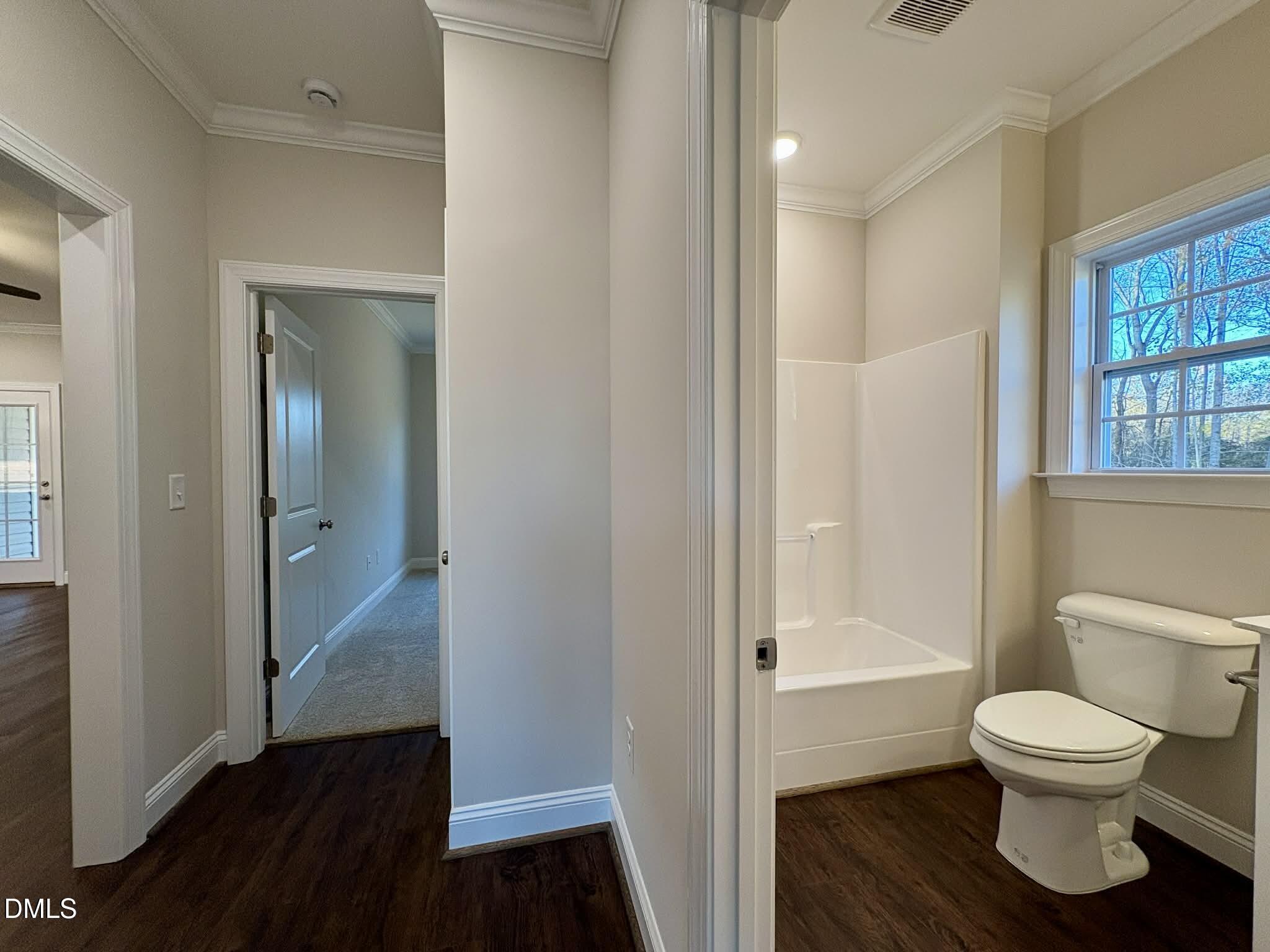 800 Emmett Ct Spring Spring Hope, NC 27882 - Photo 38 of 62 a bathroom with a toilet and a shower