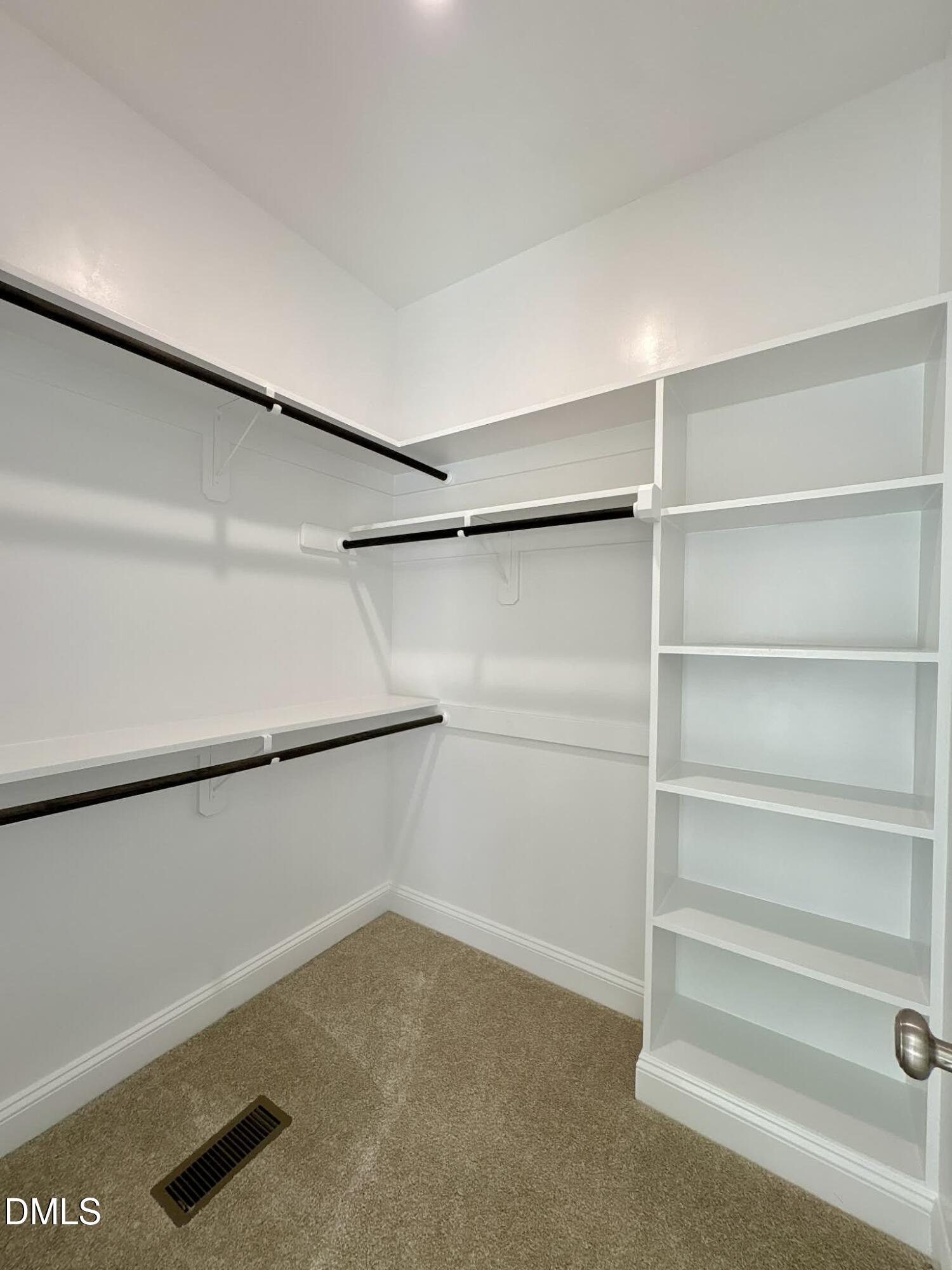 800 Emmett Ct Spring Spring Hope, NC 27882 - Photo 47 of 62 a view of an empty walk in closet