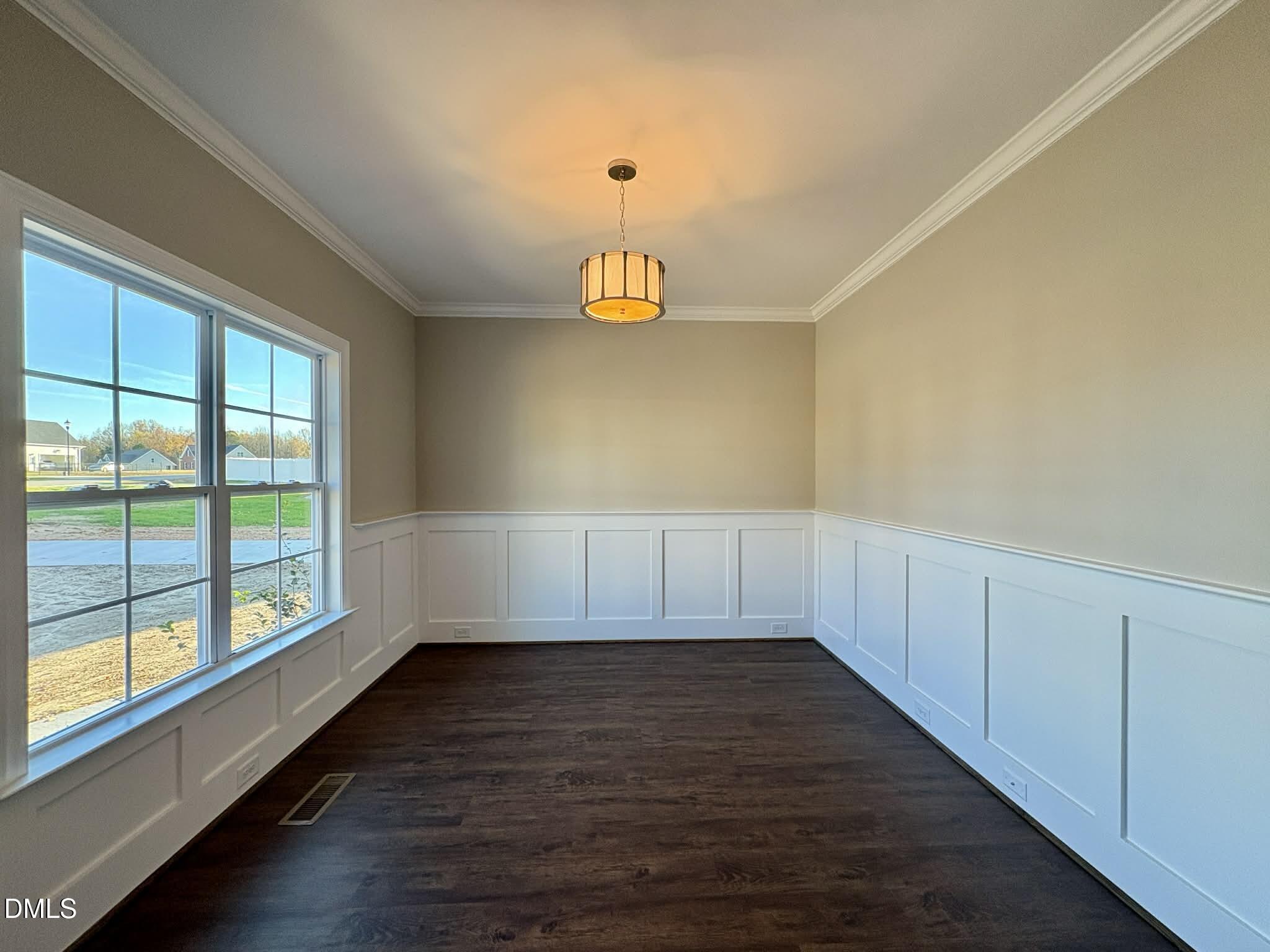 800 Emmett Ct Spring Spring Hope, NC 27882 - Photo 6 of 62 a view of an empty room with a window