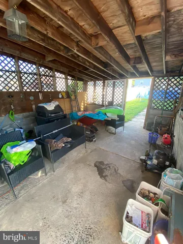 a view of a backyard with potted plants