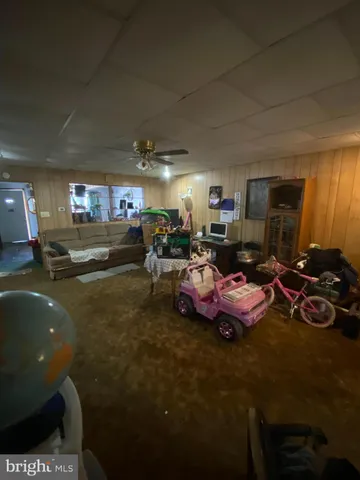 a bedroom with bed and window