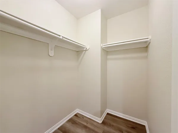 a view of small space with racks on the wall