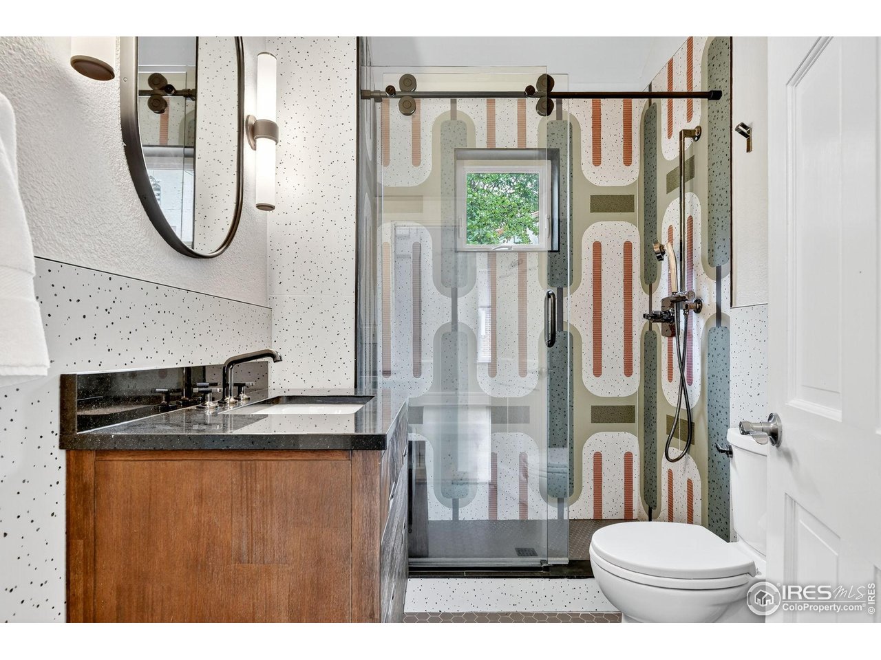 2065 Holly Street Denver, CO 80207 - Photo 12 of 46 Gorgeous Designer Bathroom, Custom Tile surround and frameless shower