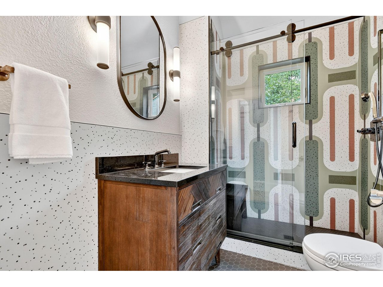 2065 Holly Street Denver, CO 80207 - Photo 13 of 46 Gorgeous Designer Bathroom, Custom Tile surround and frameless shower