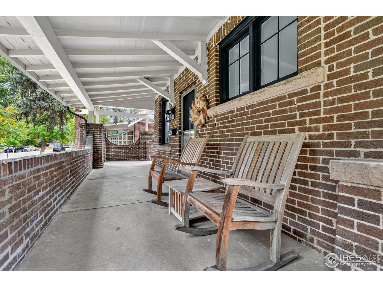 2065 Holly Street Denver, CO 80207 - Photo 2 of 46 Expansive 2 sided Porch