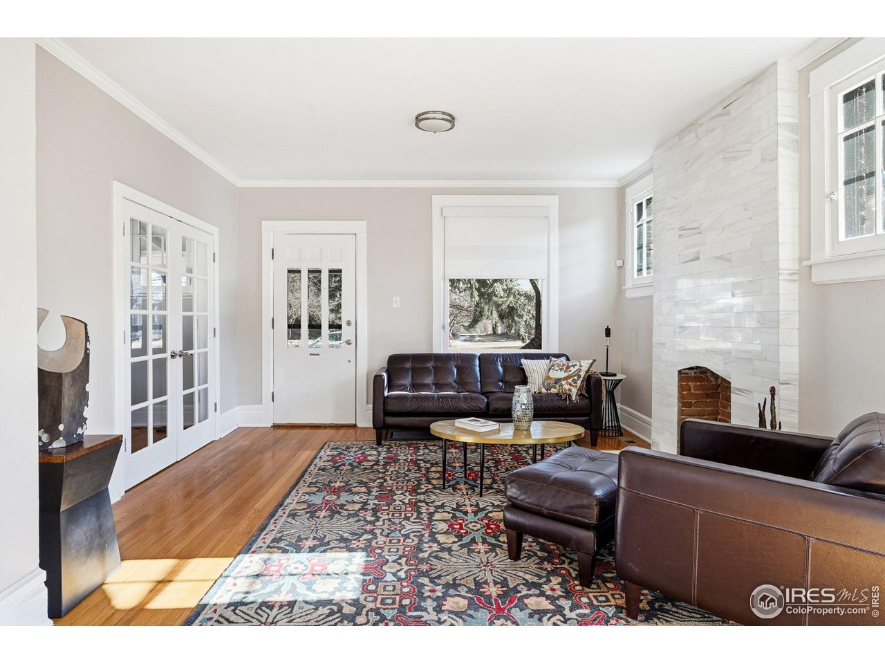 2065 Holly Street Denver, CO 80207 - Photo 4 of 46 Fresh Paint-LR overlooks front porch and open to the DR and Kitchen