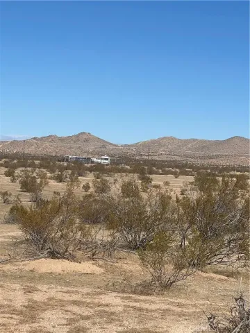 a view of a road with an ocean view