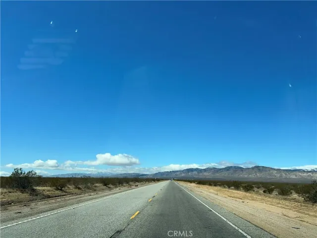 a view of a lake and a yard