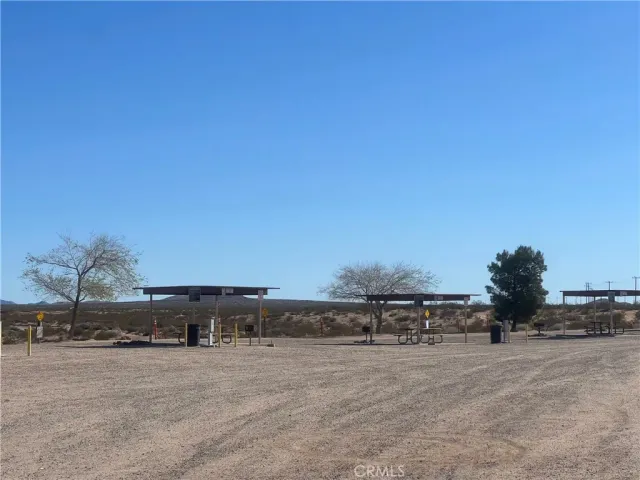 a view of a road with a building in the background