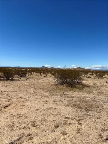 a view of mountain with lake view