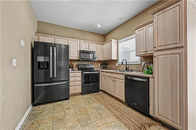 $210,000 | 1645 Southwest Madison Street, Lee's Summit, MO 64081