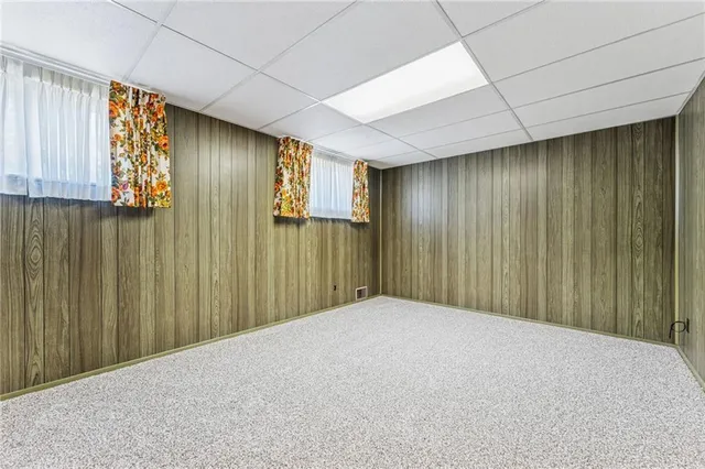 a view of a livingroom with a wooden door