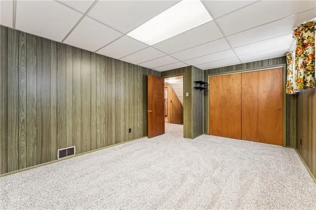 a view of a livingroom with a wooden door