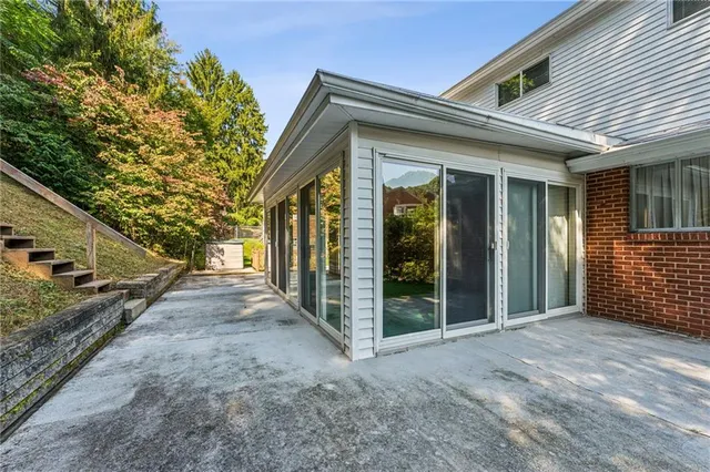 a front view of a house with a garage