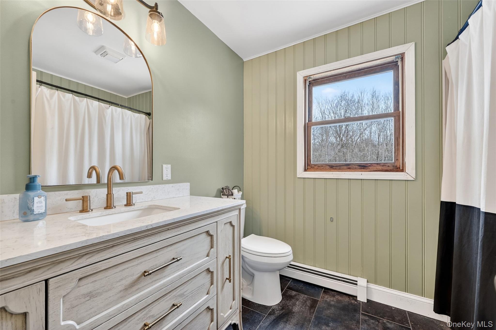 917 Scotchtown Collabar Road Middletown, NY 10941 - Photo 16 of 33 a bathroom with a granite countertop sink mirror vanity and toilet
