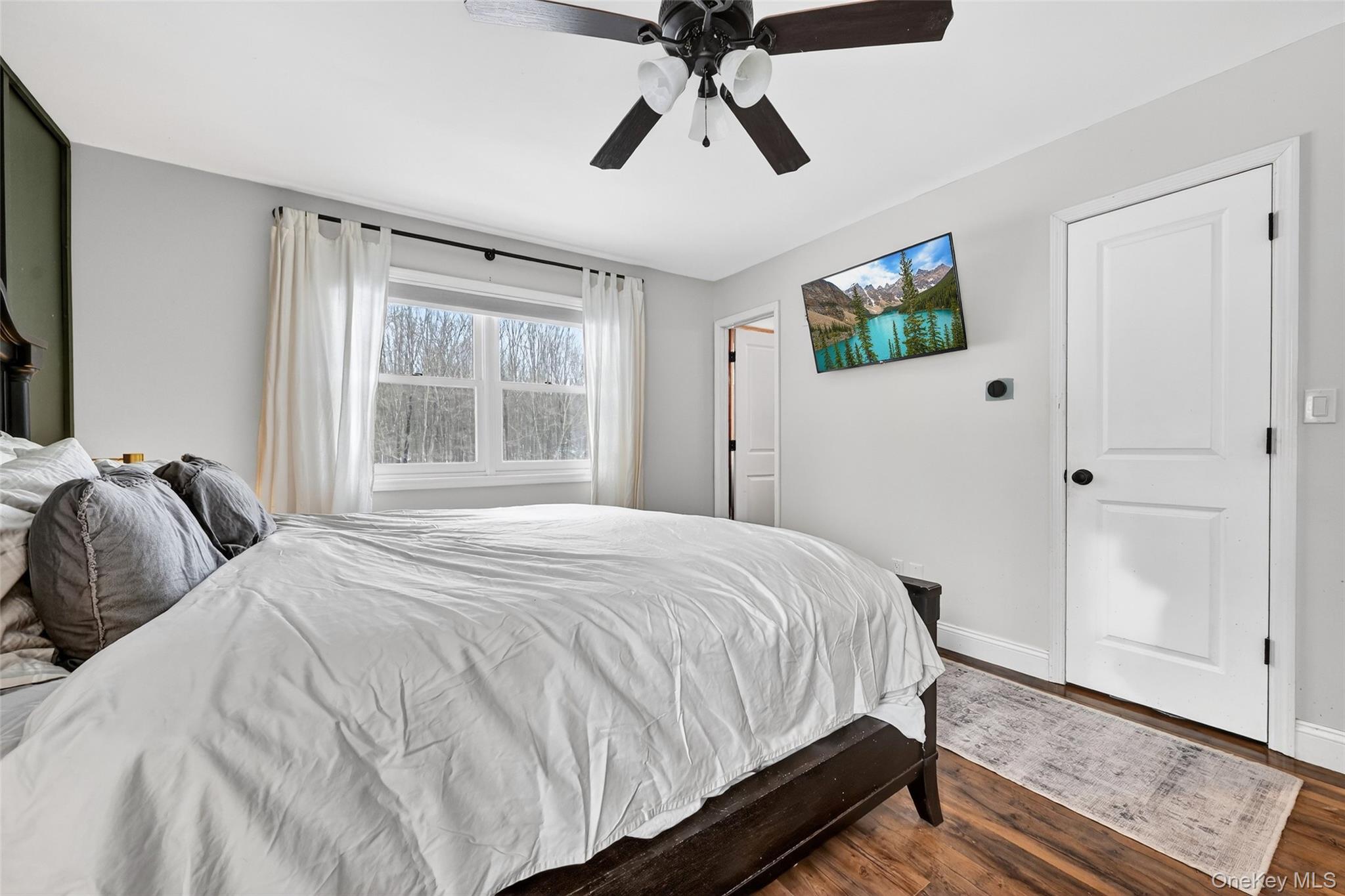 917 Scotchtown Collabar Road Middletown, NY 10941 - Photo 22 of 33 a bedroom with a bed and a window